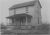 Chalmer Eby and Chloe Brehms home after 1913 flood. Robert is standing by the porch.